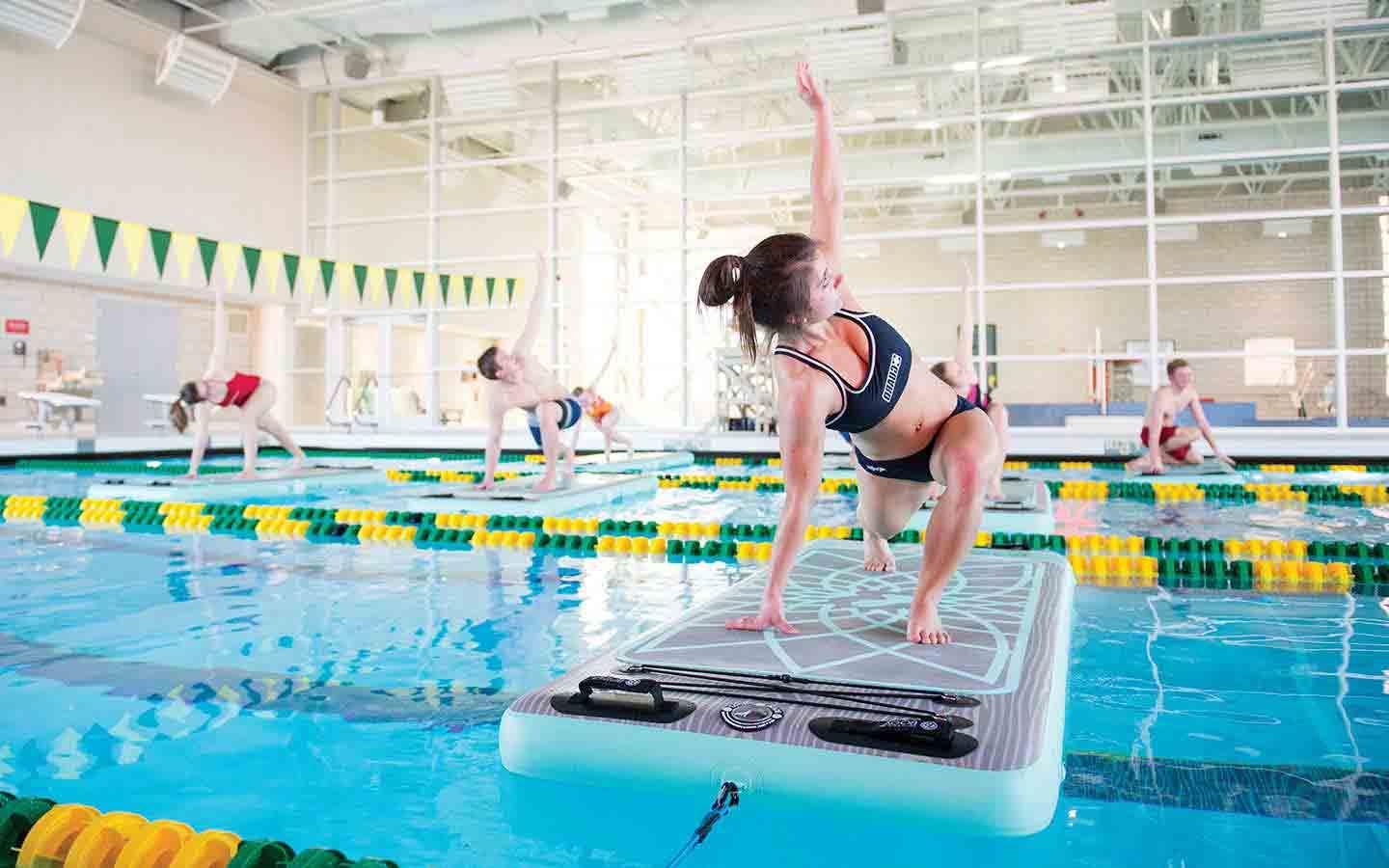 paddle-board yoga at wellness center